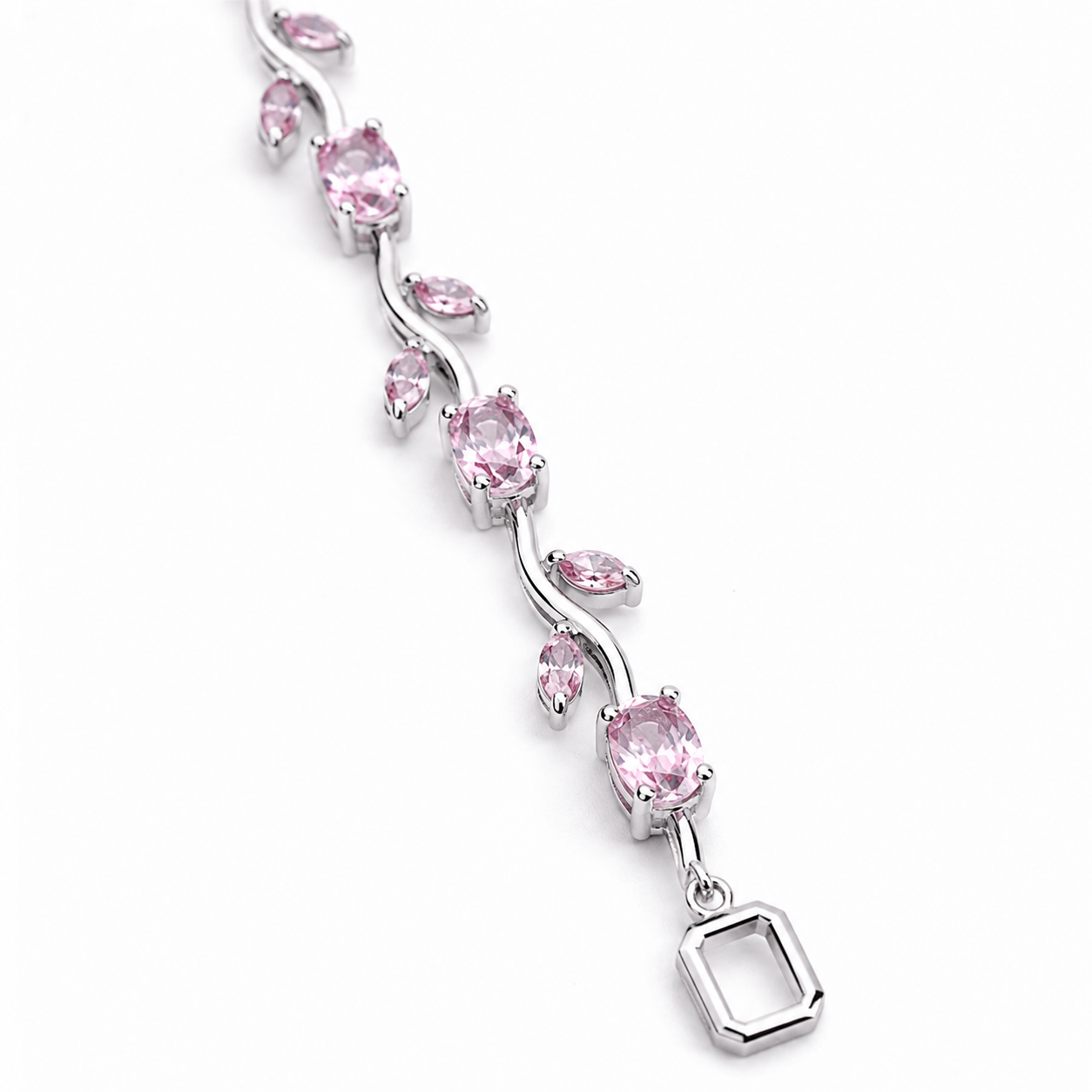 Elegant silver bracelet with pink oval gemstones and dangling geometric charm, anti-tarnish jewelry for women