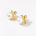 Gold bow pearl earrings with crystal accents, elegant anti-tarnish jewelry for women