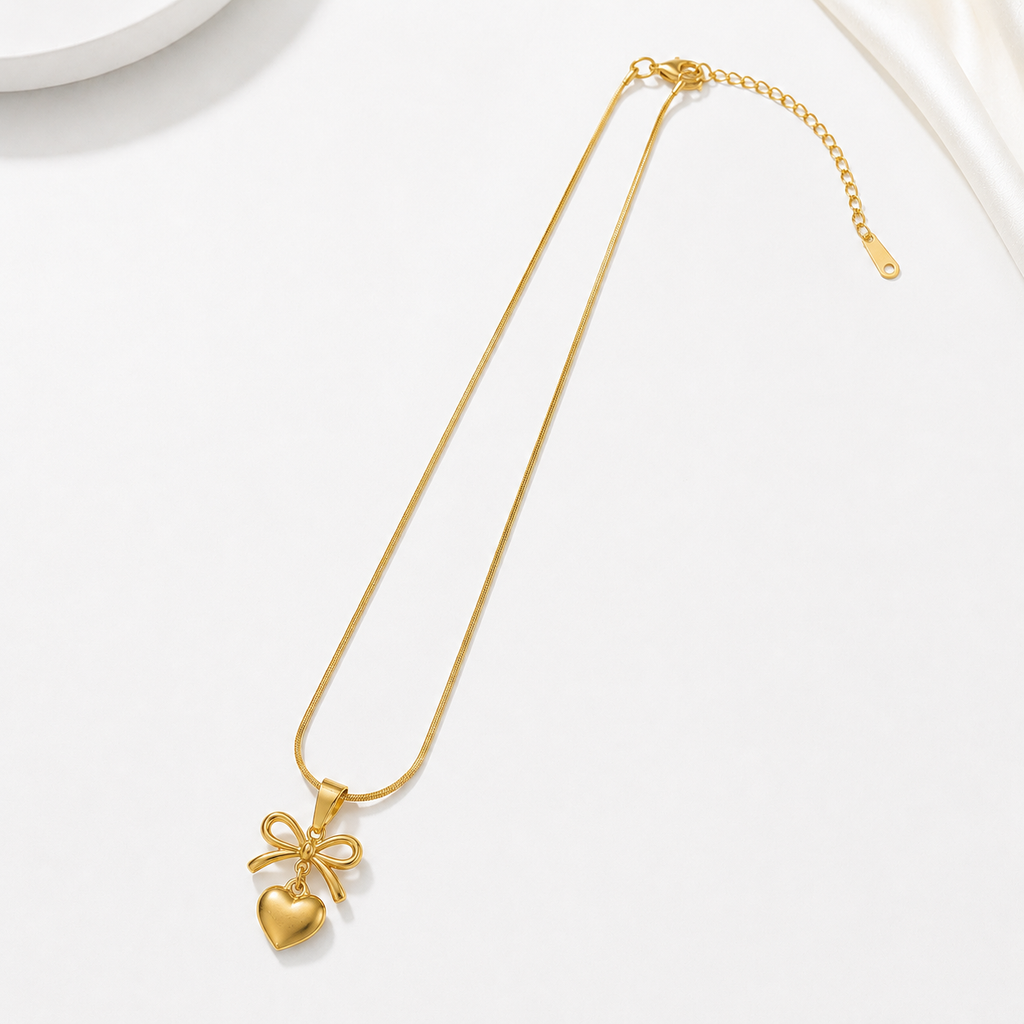 Gold heart and bow pendant necklace, anti-tarnish jewelry for women, elegant everyday luxury style