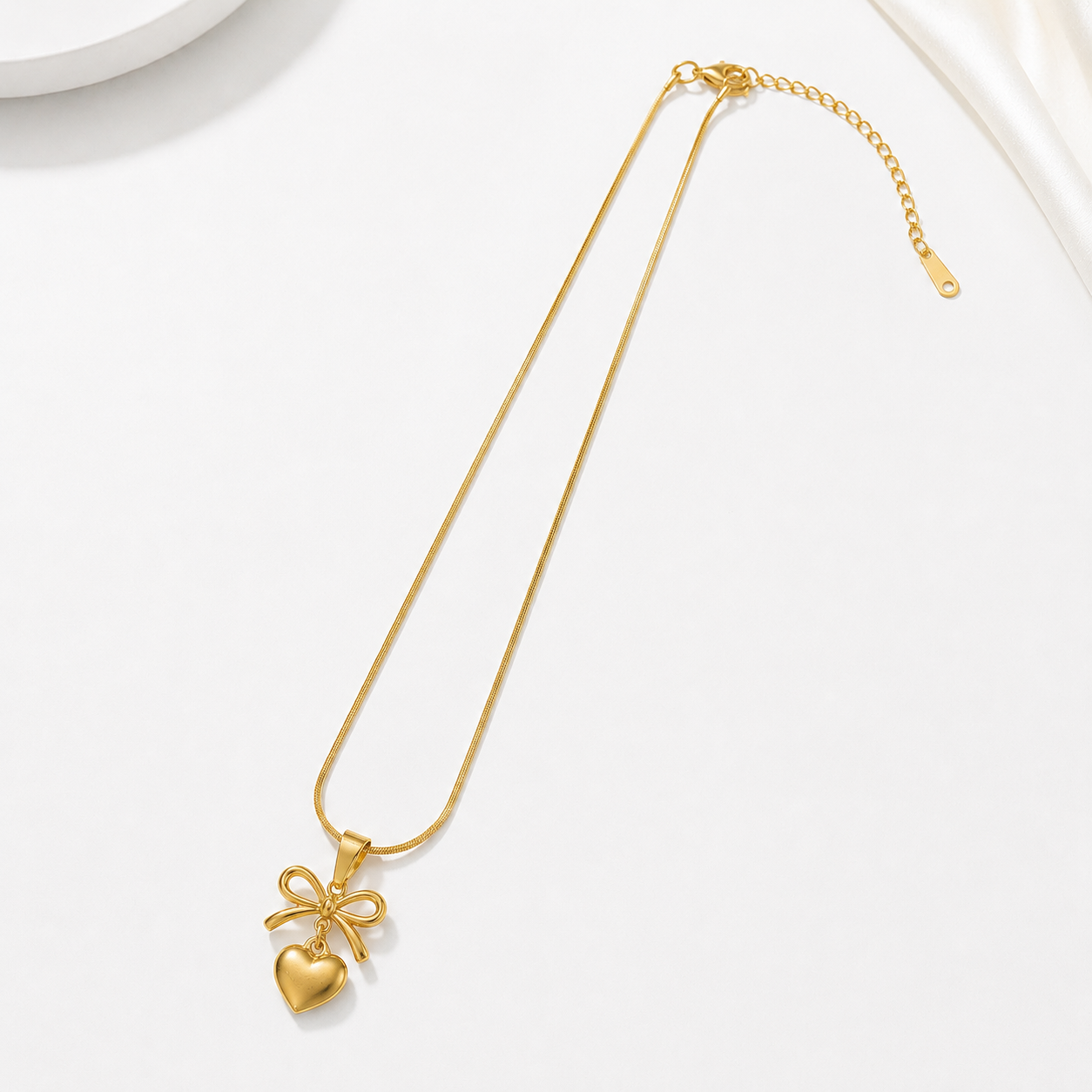 Gold heart and bow pendant necklace, anti-tarnish jewelry for women, elegant everyday luxury style