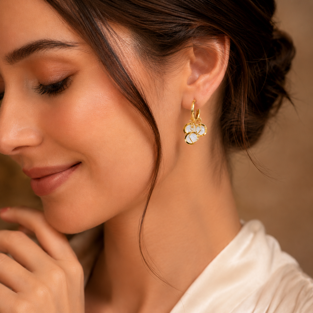 Gold hoop earrings with white stone petals, elegant anti-tarnish jewelry for women