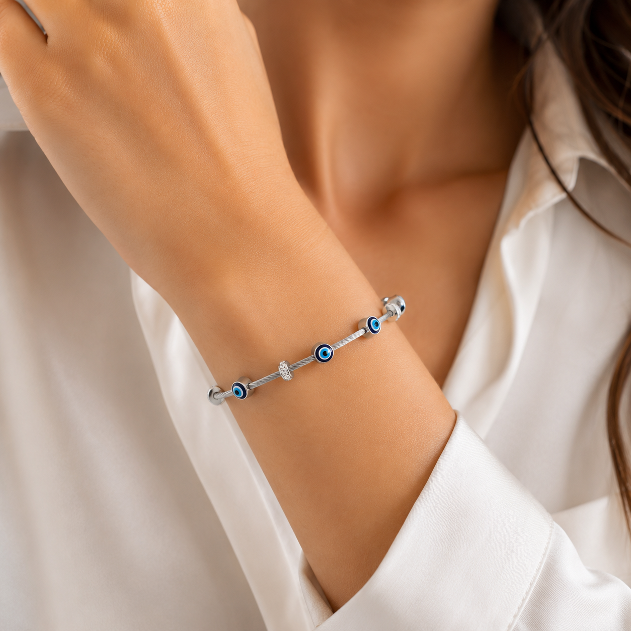 Silver evil eye bracelet with blue charms, anti-tarnish women's jewelry for everyday luxury