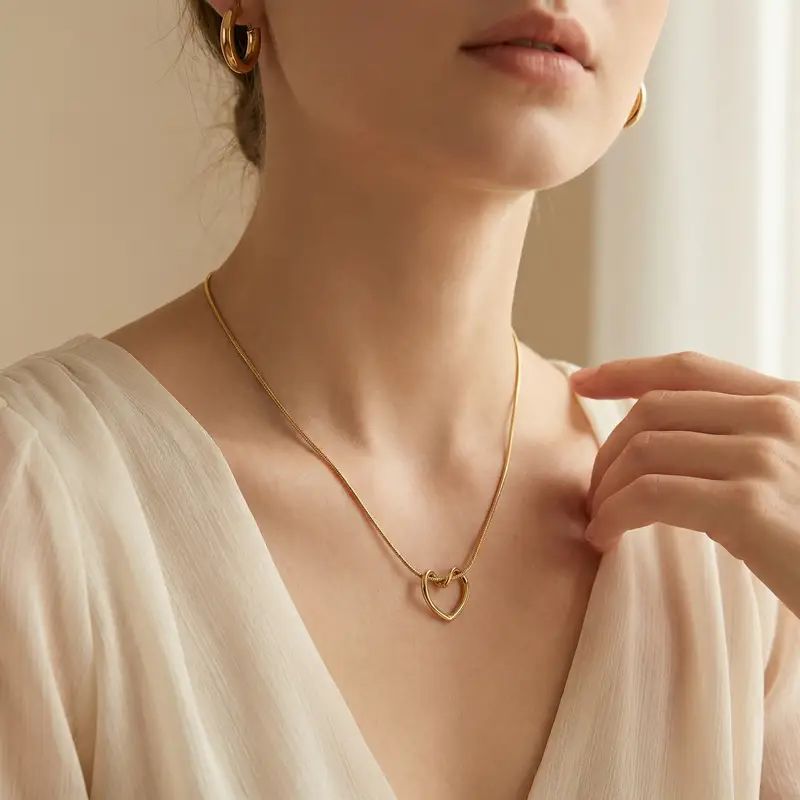 Gold heart pendant necklace for women, elegant everyday luxury jewelry with anti-tarnish finish