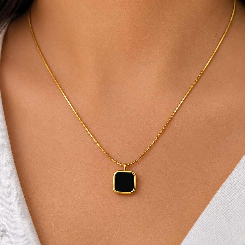 Gold square pendant necklace with black stone, elegant everyday luxury jewelry for women