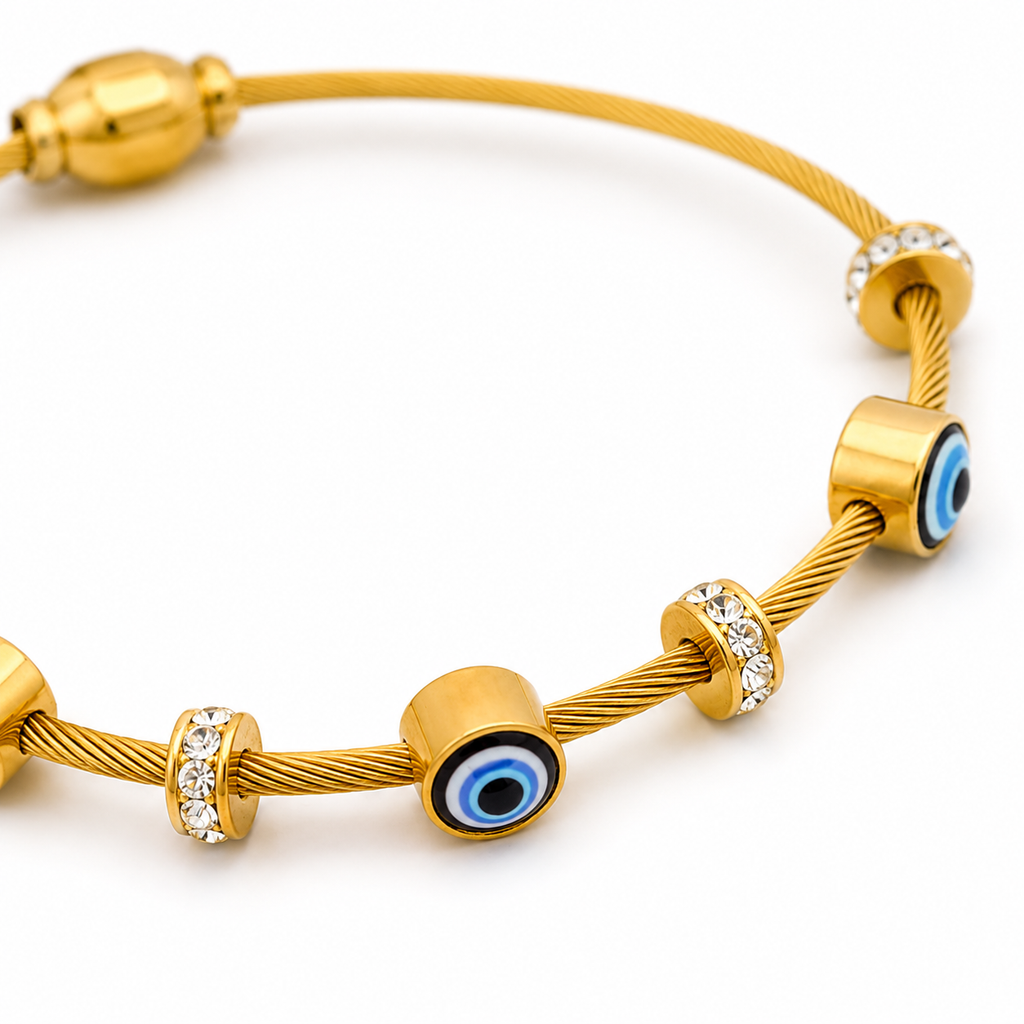 Gold evil eye bracelet with crystal accents, anti-tarnish cable chain design for women