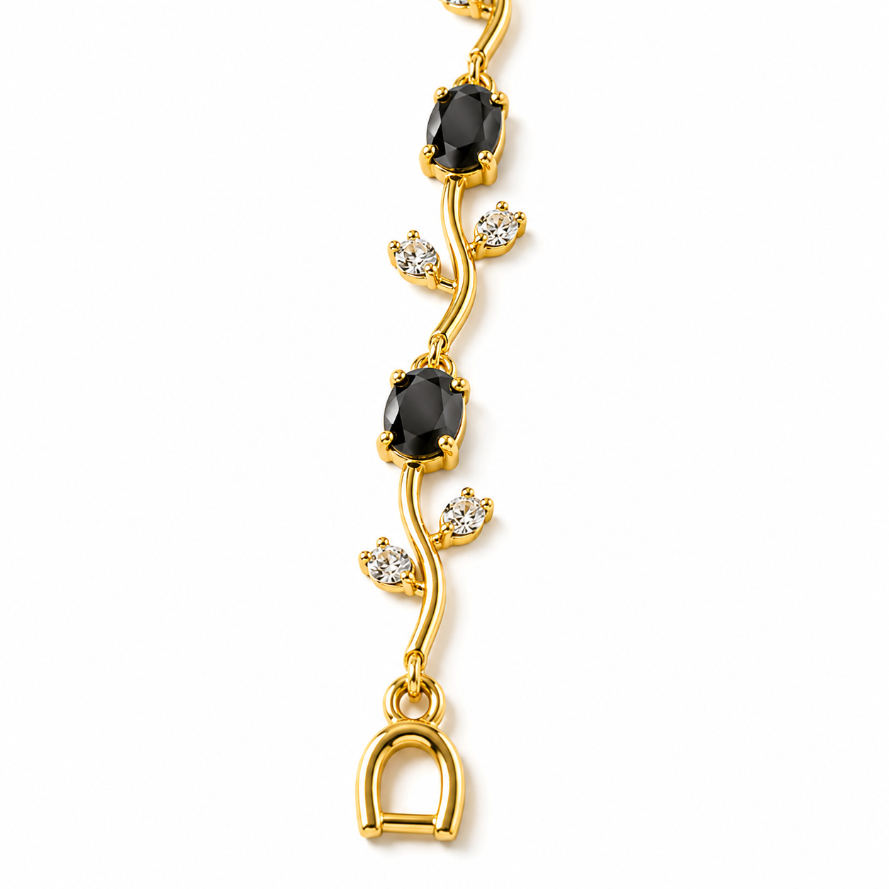 Gold bracelet with black oval stones, clear crystals, and a horseshoe charm, anti-tarnish jewelry for women