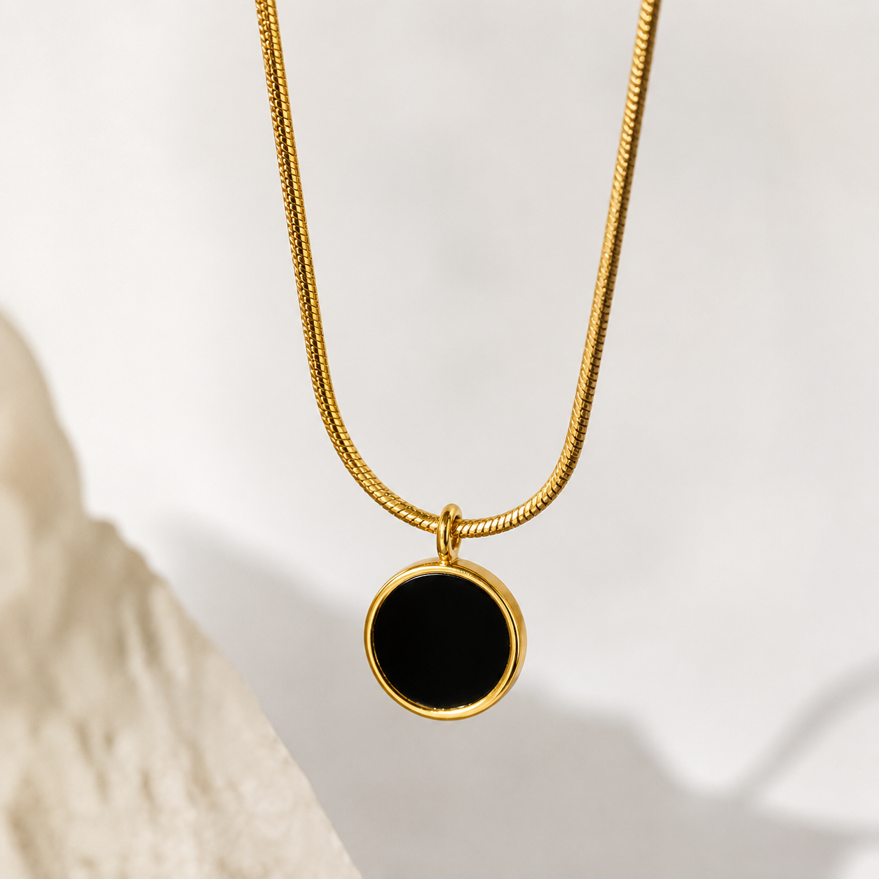 Gold snake chain necklace with black onyx pendant, anti-tarnish luxury jewelry for women