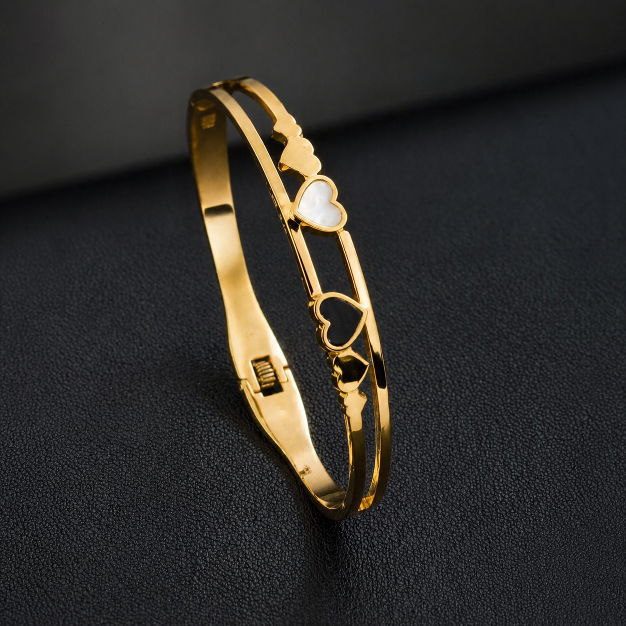 Gold bangle with heart charms, anti-tarnish jewelry for women, elegant everyday luxury style