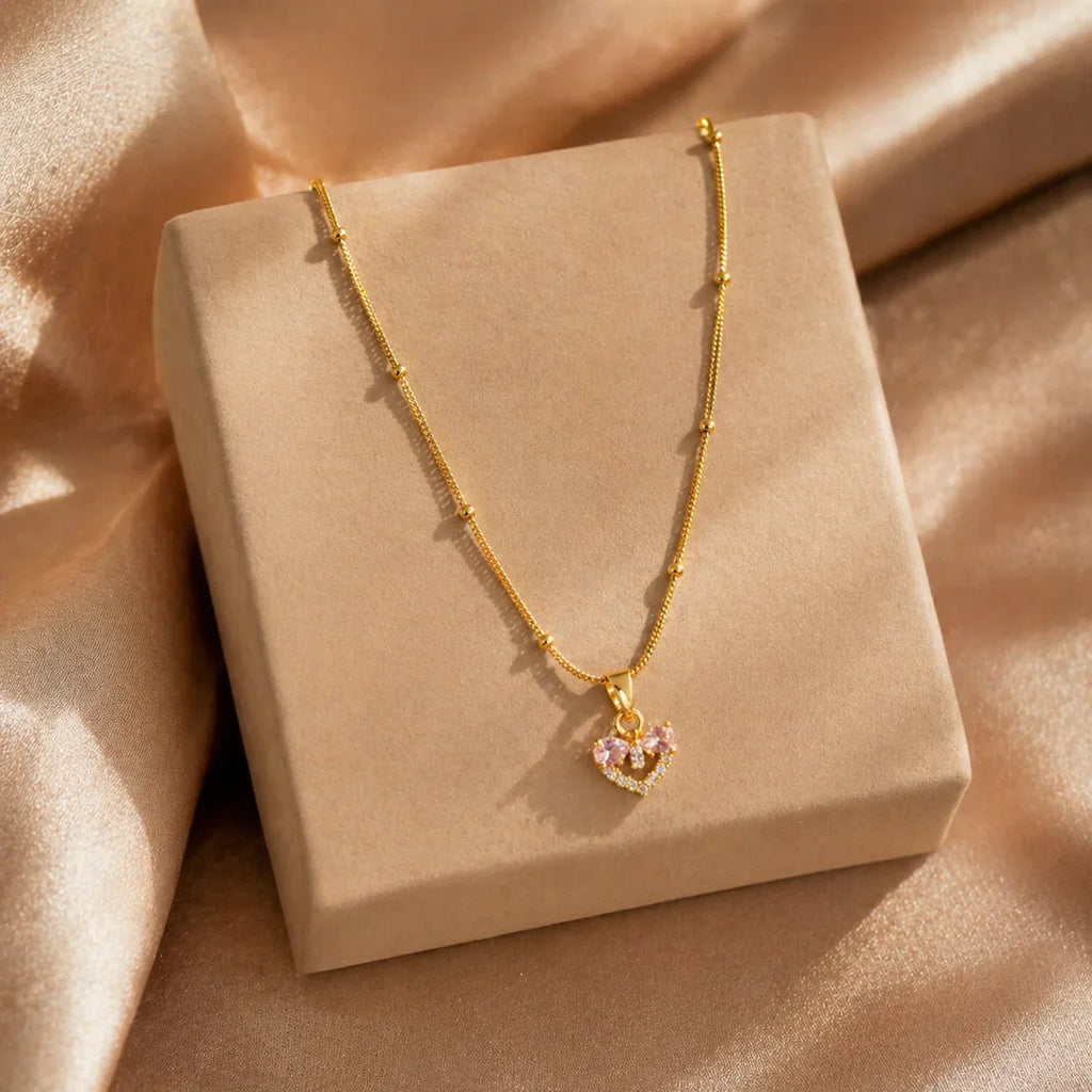 Gold heart pendant necklace with pink crystals, anti-tarnish jewelry for women, elegant everyday luxury