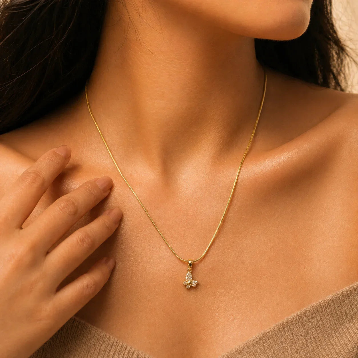 Gold butterfly pendant necklace with diamond accents, elegant everyday luxury jewelry for women
