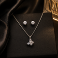 Elegant silver necklace and stud earrings set with sparkling clear stones, perfect for everyday luxury.