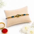 Premium Peacock Designer Rakhi for Brother – Gold Finish