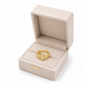 Elegant gold ring with sparkling stones in a luxury gift box, perfect for everyday luxury jewelry lovers.