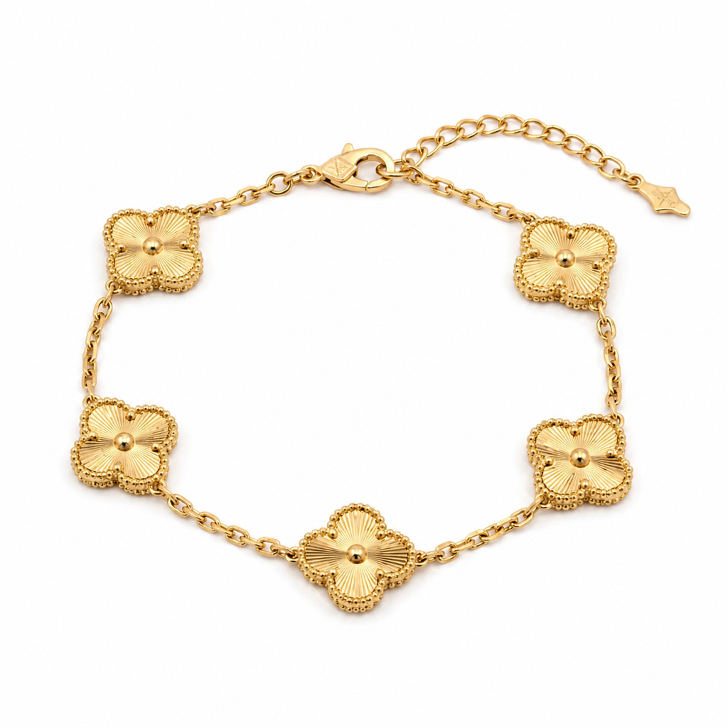 Gold flower charm bracelet with anti-tarnish finish, elegant everyday luxury jewelry for women