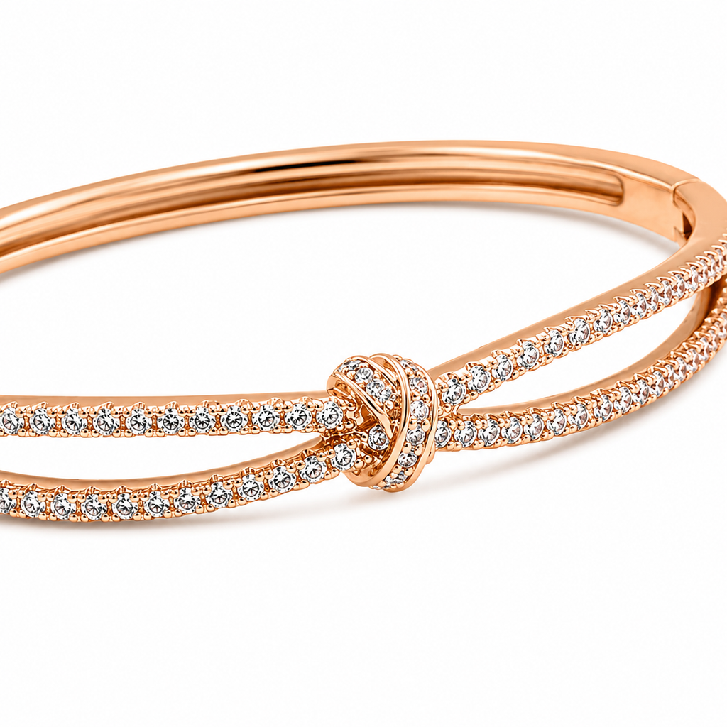 Rose gold bangle with diamond knot design, elegant anti-tarnish jewelry for women