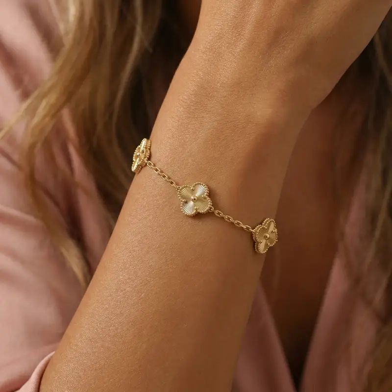 Gold flower charm bracelet for women, elegant everyday luxury jewelry